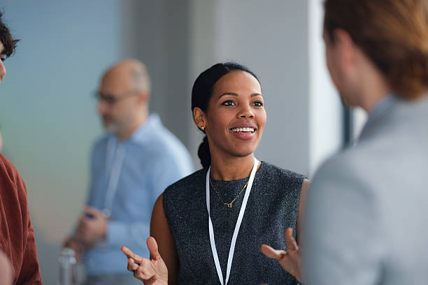 istock Confident Speaker Engages Attendees At Professional Conference And Networking Event 2260129383