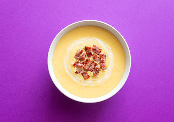 Creamy cheese soup with fried bacon. American cuisine. Recipe