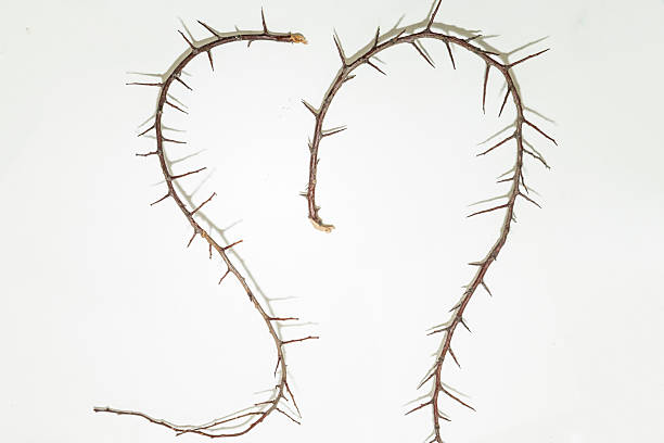 Photo of big iron heart over pink background