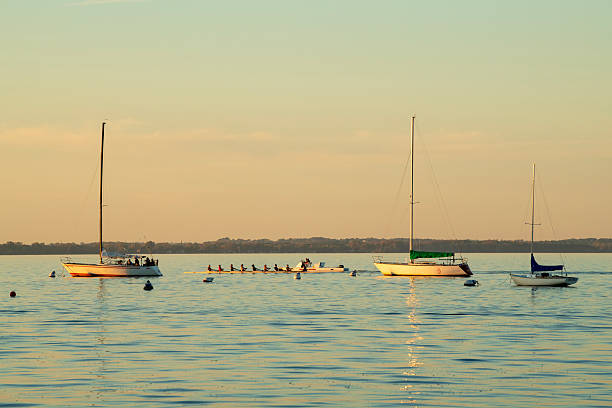 a couple of boats on the water at the pier