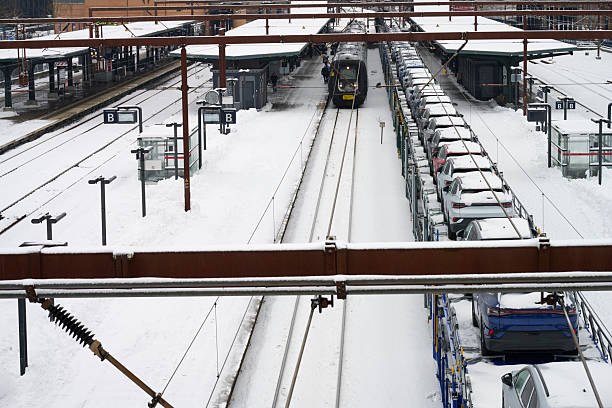 Snow covered train and railway in winter