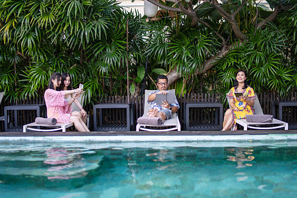 Family spend vacation time together at luxury hotel.