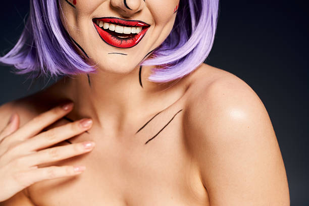 A pretty woman with a purple wig and pop up makeup, resembling a character from comics