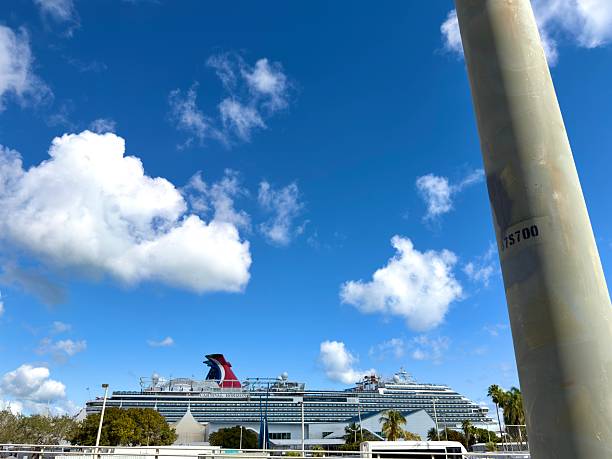 Miami, Florida, United States of America - January 5, 2026: Carnival Horizon cruise ship docked at PortMiami on a bright summer day with clear blue skies and fluffy white clouds, representing travel and tourism in Miami, Florida