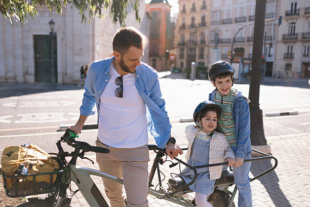 Family taking break from cycling during sightseeing