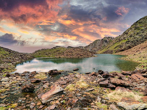 Glacial lake with a dramatic sky in Comapedrosa Park