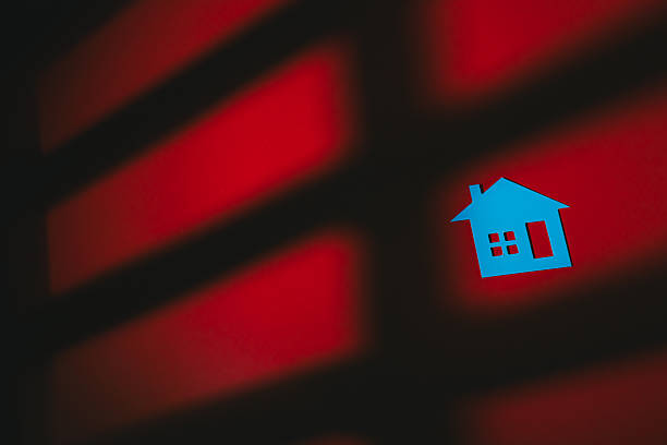 istock Real Estate concept. Blue house icon red background shadow pattern abstract design minimalistic home symbol dark contrast geometric shapes modern art isolated object 2260261422