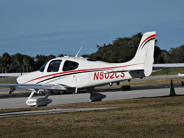 Pompano Beach, Broward County, Florida, USA, February 4, 2026. A Cirrus  fixed wing single engine (4 seats / 1 engine) N802CS parked at the Pompano Beach Air Park.