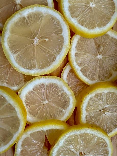 Close-up slices of fresh lemons.