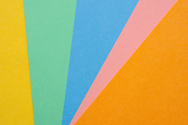 Layers of pastel-colored construction paper