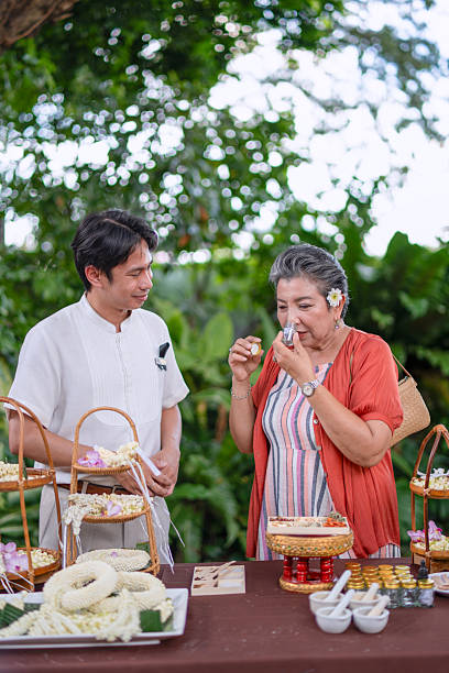 Senior woman is learning to make thai Inhaler at luxury hotel.