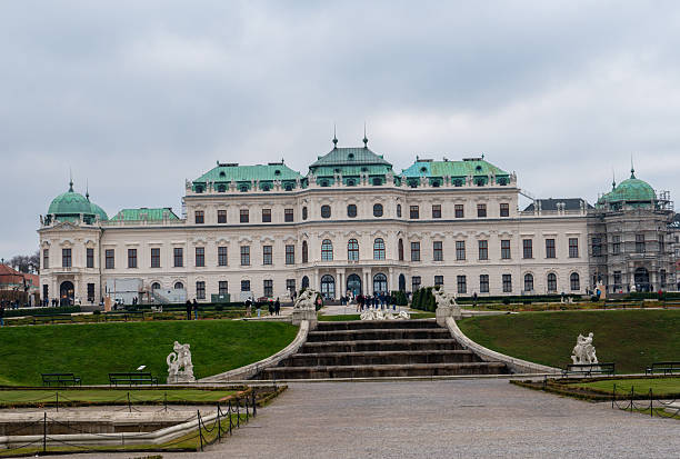 Wien, Austria - July 28, 2023: Belvedere Palace in summer sunny day. Baroque beautiful facade with statues and bas-reliefs of Lower Belvedere.