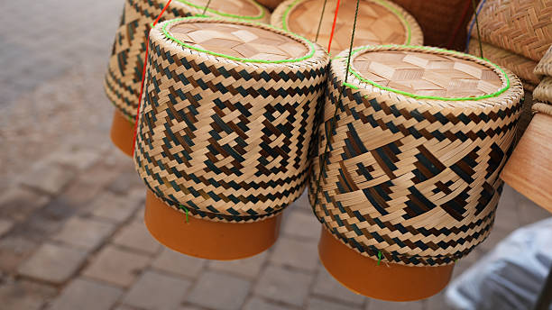 Handcrafted woven baskets display intricate patterns and vibrant colors, showcasing traditional craftsmanship and cultural heritage