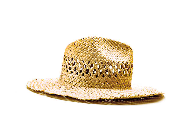 Sun hat made of straw against a white background