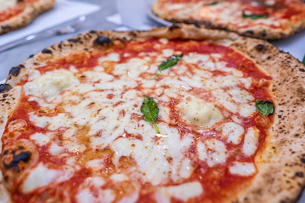 Neapolitan homemade pizza margarita from the brick oven.