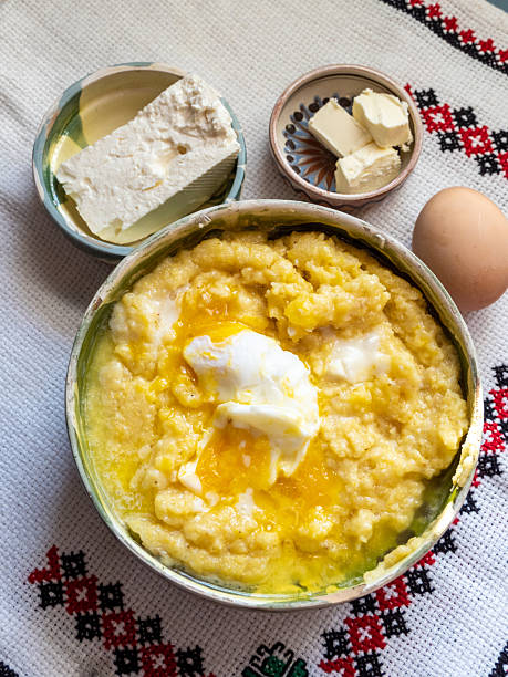 polenta mixed with cheese, eggs and butter, romanian dish mamaliga cu branza dish