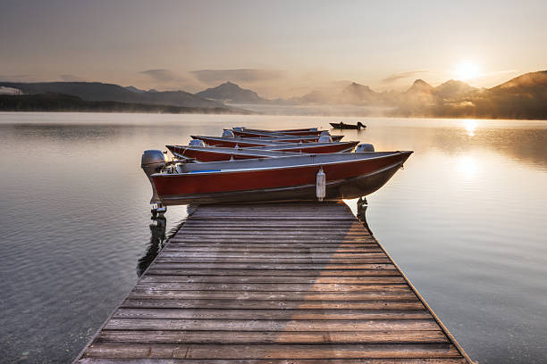 Floating dock with canoes on a beautiful mountain lake
