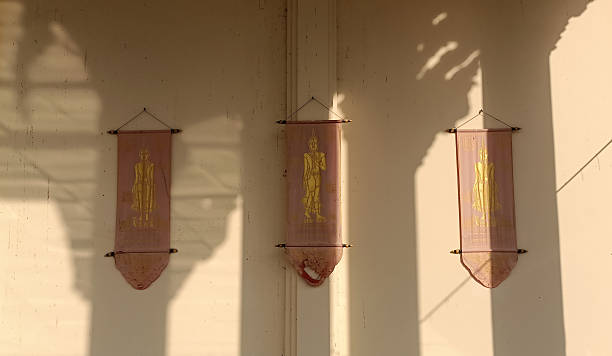 Buddhist Canvas Painting Art on Temple Wall with Pillar Shadows