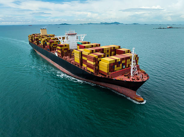 istock Aerial View Of Large Cargo Container Ship Sailing On Open Sea For Global Logistics 2260394311