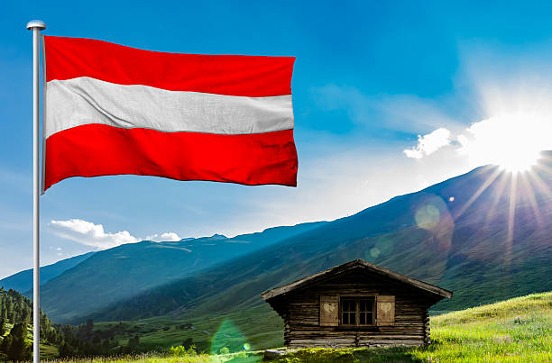 Hiking trail in the Austrian Alps with an alpine hut