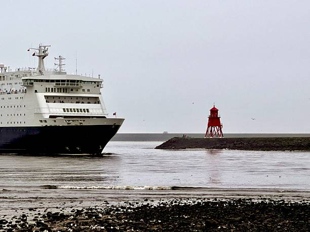 A large passenger ferry arriving on the River Tyne at Tynemouth