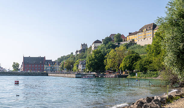 Meersburg castle and harbor town showcasing historic architecture and green landscape along lake constance