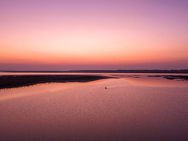 Sunset over the lake, beautiful evening glow