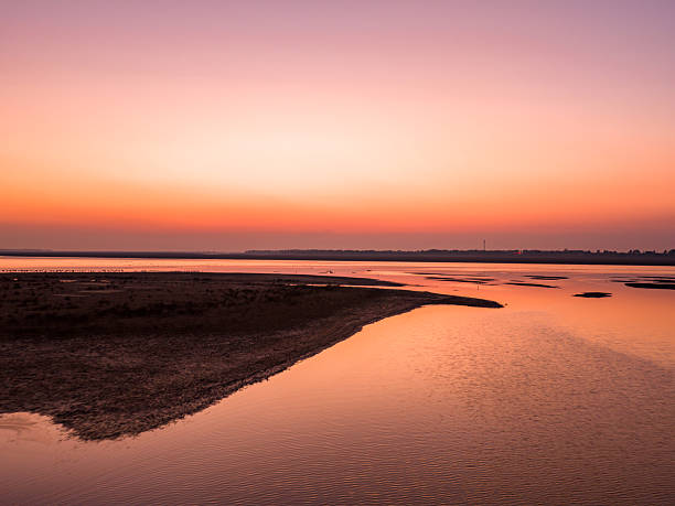 Sunset over the lake, beautiful evening glow