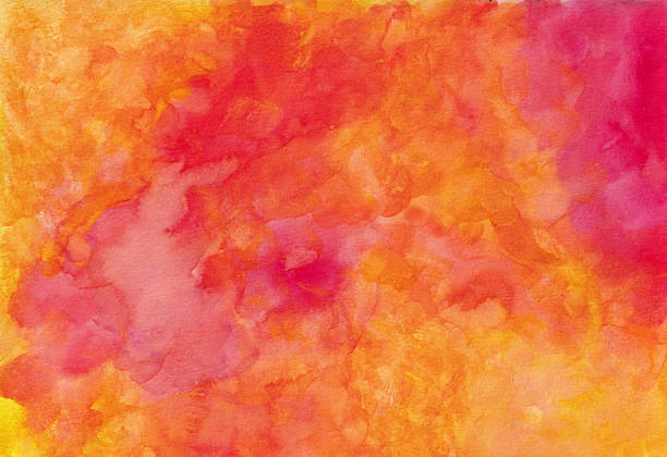 This is an abstract background created using shades of red and orange watercolors on paper. There is a mottled texture from the blend of colors and water drips. This is a horizontal painting that can be rotated vertical if needed.