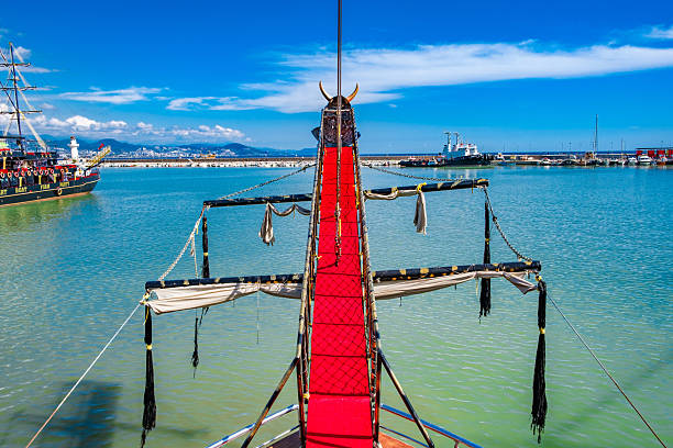 Duplicated Viking style boat in a pier...