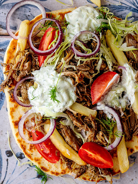 Mediterranean street food dish called beef gyros in pita bread