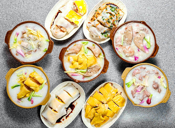 Delicious Asian rice porridge and dumplings on table top view