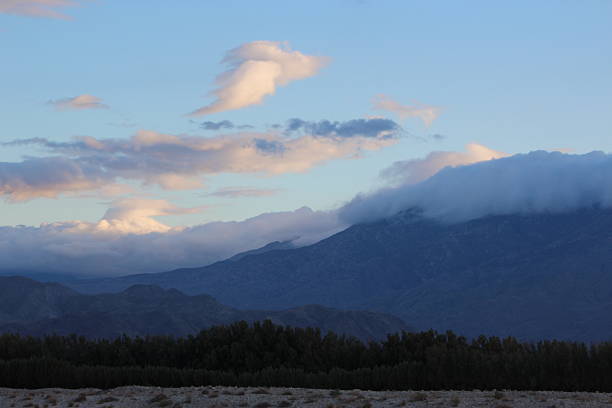 Desert Mountain Range Landscape and cloudscape found in eastern San Bernardino County, California, near Blythe and the Whipple Mountains located west of the Colorado River while driving I10, the east-west Interstate Highway.