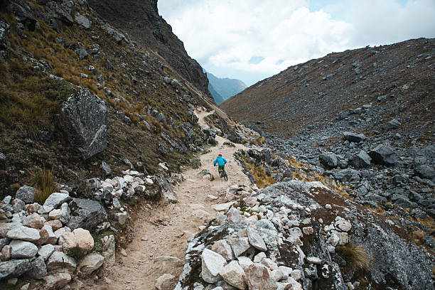Country road to Copa and Huascaran mountain range in majestic Cordillera Blanca at gold colored sunset, snowcapped Peruvian Andes - Huaraz, Ancash region, Peru\n\nCopa (possibly from qupa, a Quechua word for the mineral turquoise and the turquoise color) is a mountain in the Andes of Peru whose summit reaches about 6,188 metres (20,302 ft) above sea level. It is situated in the Ancash Region, Asunción Province, Chacas District, and in the Carhuaz Province, Marcará District, south-east of Hualcán.