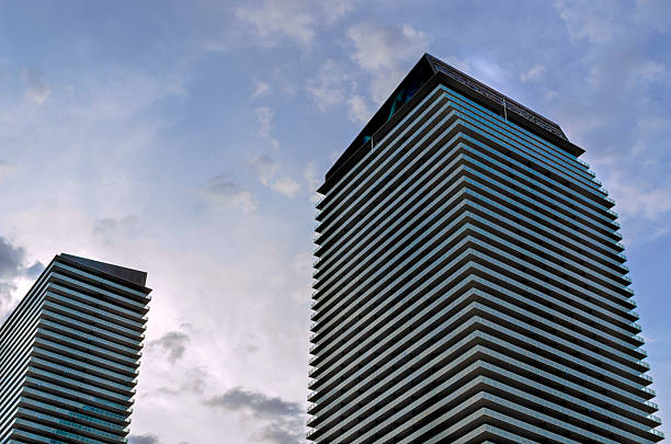Buildings stand high against sky as clouds gather overhead in Las Vegas