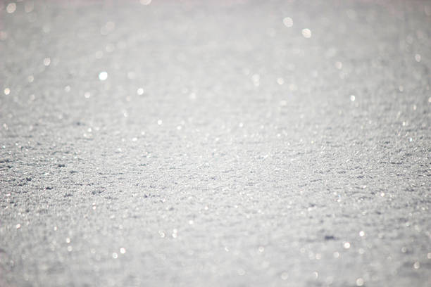 Fresh clean snow texture closeup, winter background with ice crystals