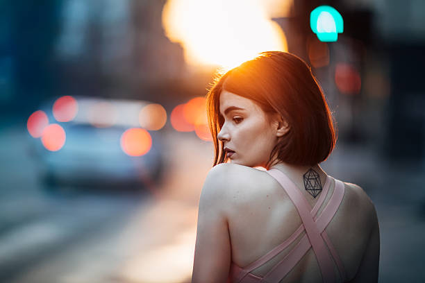 Young girl on street at sunset