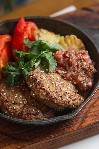 Georgian meat cutlets with tomatoes and herbs