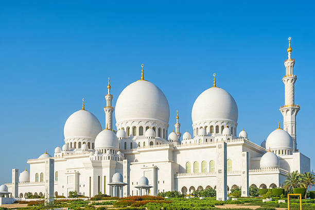 istock Sheikh Zayed Grand Mosque with multiple domes and minarets under clear blue sky in Abu Dhabi, United Arab Emirates. Islamic architectural heritage. Travel and tourism in UAE 2260763863