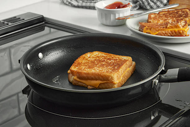 Grilled Cheese Sandwich Cooking in Skillet on Stovetop, Food Series