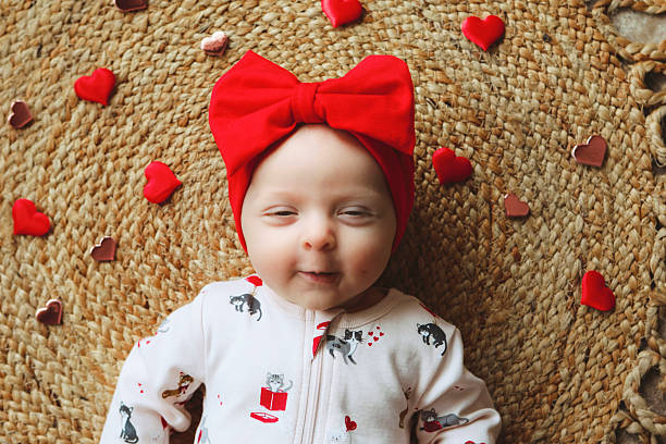 istock Baby Girl with Hearts 2260769972