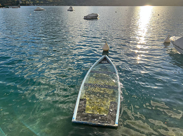 Old rowboat filled with water