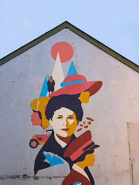 Tromso, Norway - December 23, 2025: Women portraits painted on residential house wall downtown in Nordre Tollbodgate