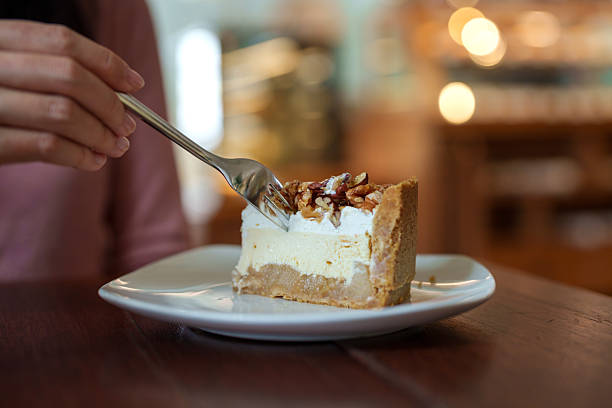 Salted Caramel Apple Cheesecake Served at Cafe Table