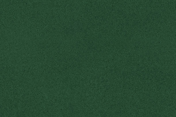 Green cardboard texture background.