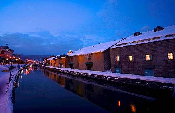 Otaru Canal is a historic canal in Hokkaido, Japan, built in 1914 for shipping goods to the city's warehouses. Today, it is a beautifully preserved symbol of Otaru's port town heritage. The canal is lined with old stone warehouses, many now converted into museums, shops, and restaurants. Its iconic gas lamps create a romantic atmosphere, especially at dusk. The scenic promenade is perfect for a leisurely stroll. The canal is also the centerpiece of the famous Otaru Snow Light Path Festival in winter. It's a must-visit destination, seamlessly blending historical charm with modern tourism.