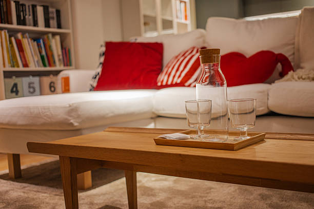 Cozy evening, glasses of wine and warm lighting.