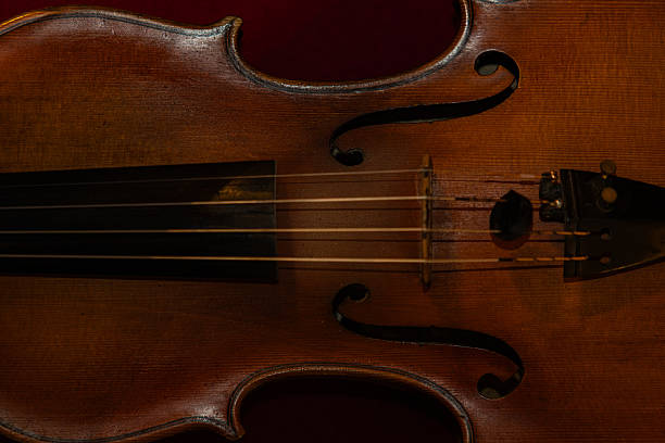 Close-Up Of Violin Over White Background