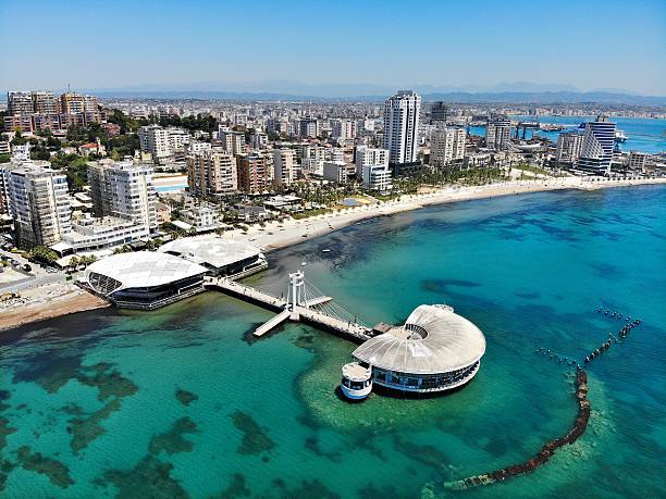 Durres city, Albania. Summer sunny day skyline. Aerial view with pier.