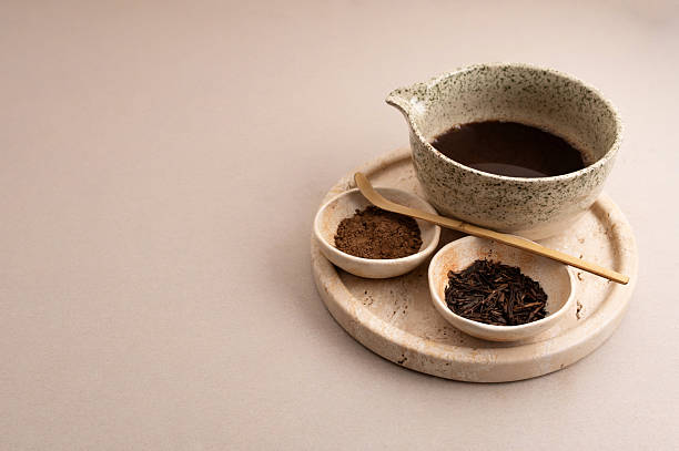 Hojicha Latte with Roasted Green Tea and Powder on Beige Background